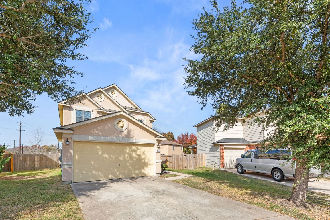 2009 Perkins Place Georgetown, TX 78626 - Photo 4 of 36 a view of a house with a yard