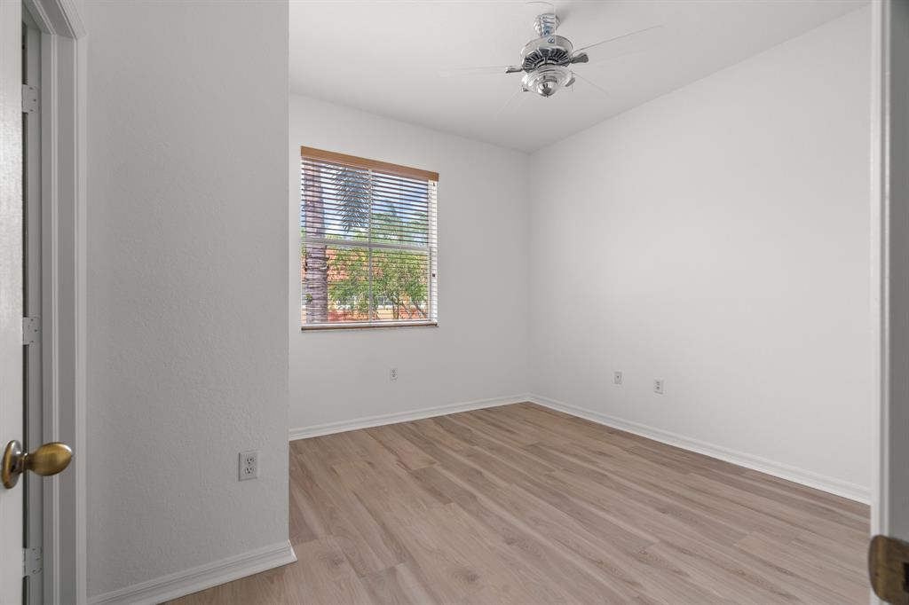 3210 Merrick Terrace, Unit 1503 Margate, FL 33063 - Photo 19 of 24 an empty room with a window
