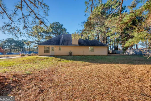 a house view with a swimming pool