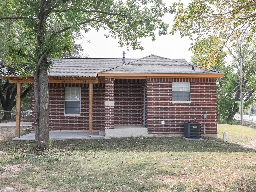 1518 Rochester Street Bryan, TX 77803 - Photo 15 of 23 a front view of a house with garden
