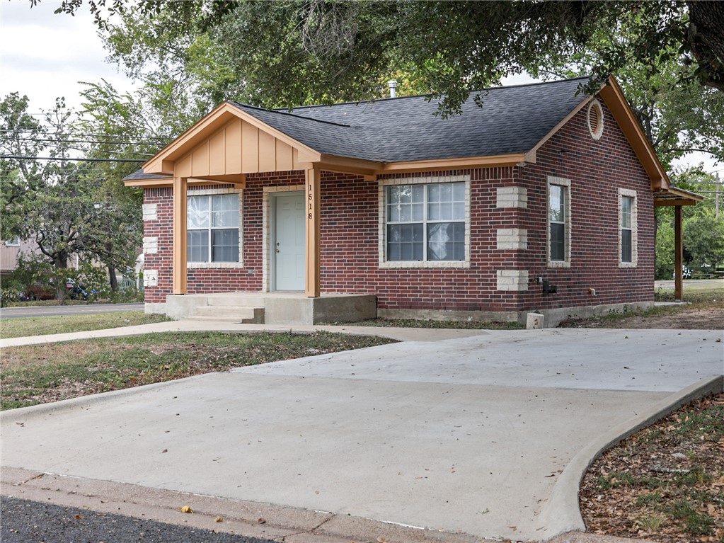 1518 Rochester Street Bryan, TX 77803 - Photo 23 of 23 a front view of a house with a yard