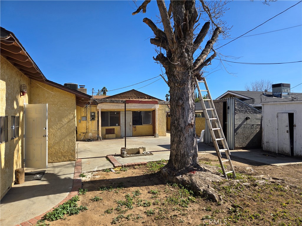 11067 Maureen Drive Cherry Valley, CA 92223 - Photo 19 of 23 a front view of a house with garden