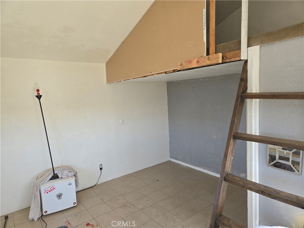 11067 Maureen Drive Cherry Valley, CA 92223 - Photo 21 of 23 a view of storage and utility room with windows