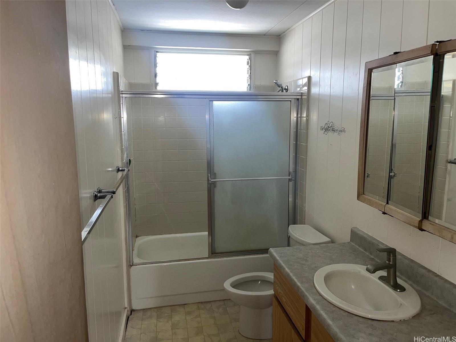 2153 Booth Road Honolulu, HI 96813 - Photo 16 of 18 a bathroom with a sink toilet and shower