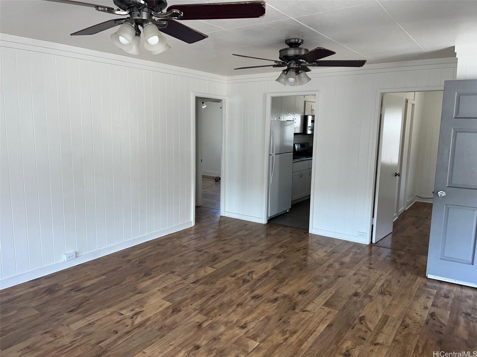 2153 Booth Road Honolulu, HI 96813 - Photo 5 of 18 a view of an empty room with a ceiling fan