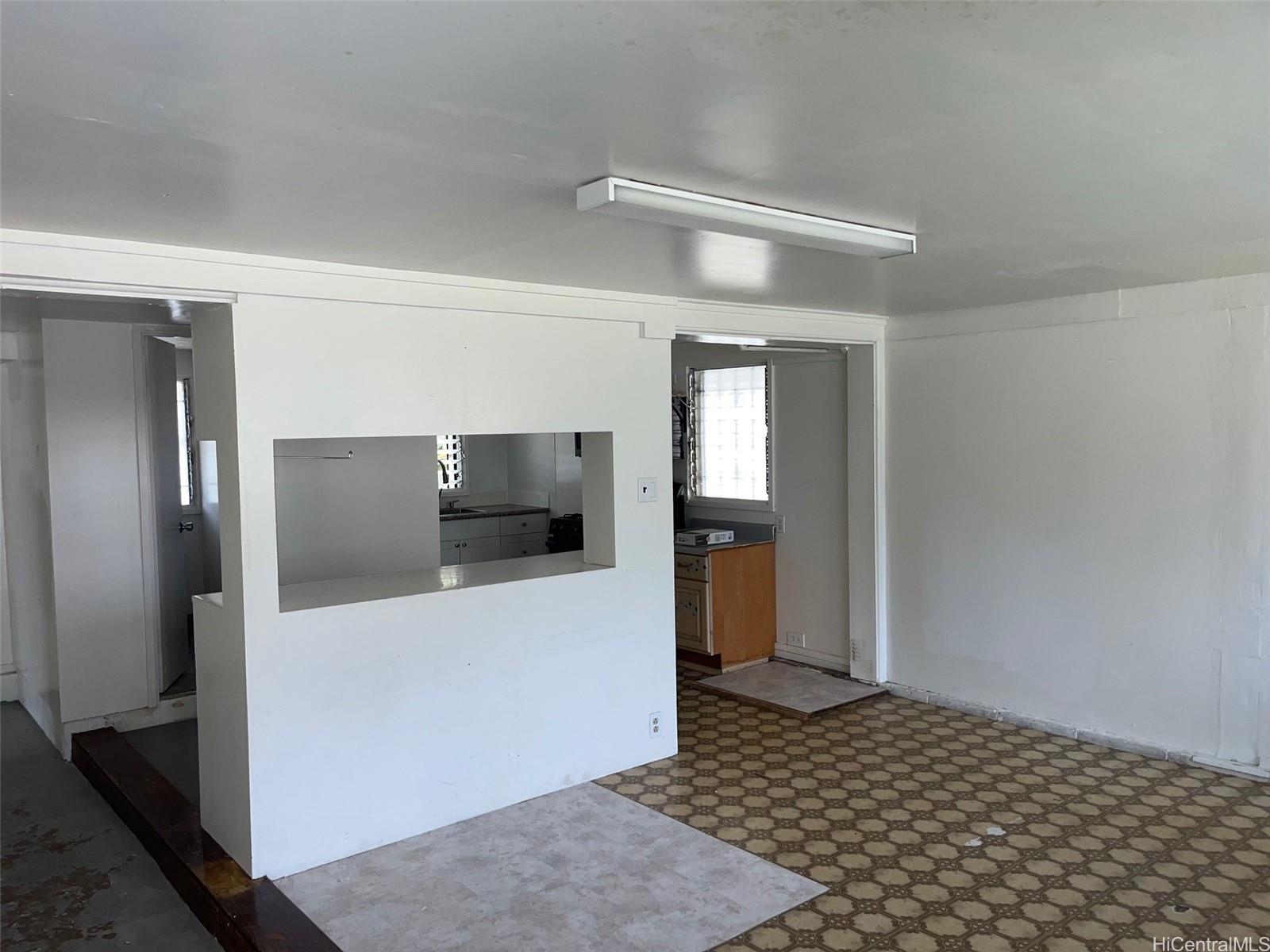 2153 Booth Road Honolulu, HI 96813 - Photo 9 of 18 a view of a hallway with wooden floor