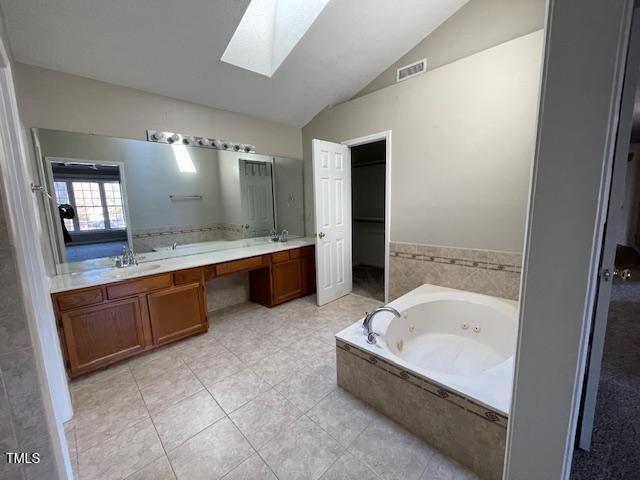 107 Glen Alpine Circle Cary, NC 27513 - Photo 13 of 17 a spacious bathroom with a tub sink and mirror