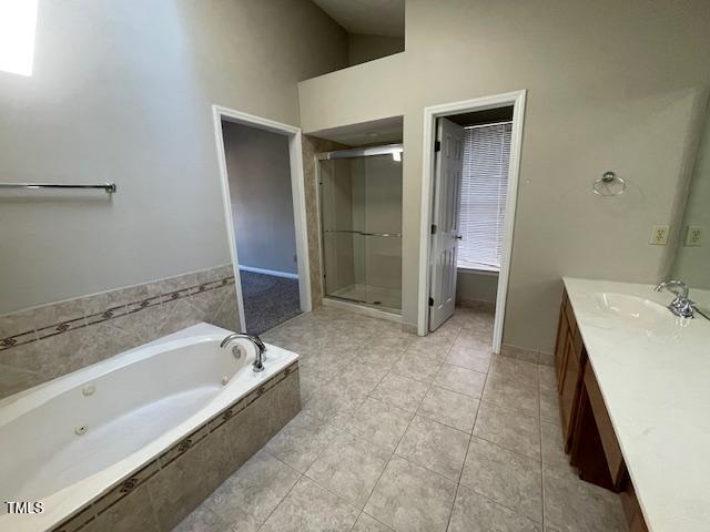 107 Glen Alpine Circle Cary, NC 27513 - Photo 14 of 17 a spacious bathroom with a tub shower and sink