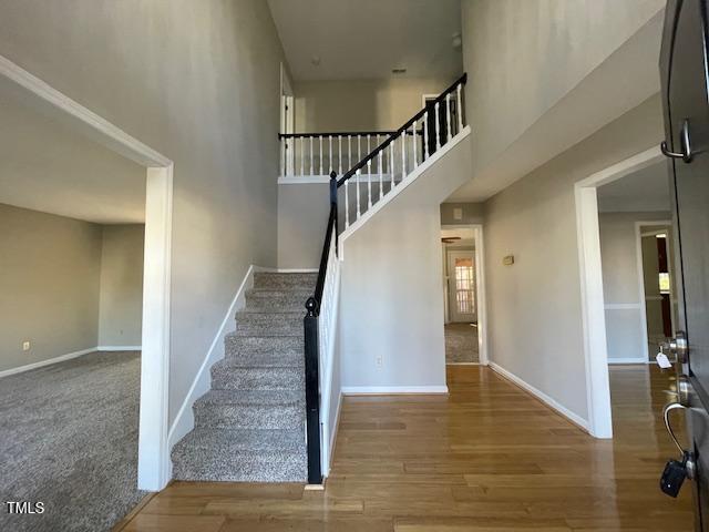 107 Glen Alpine Circle Cary, NC 27513 - Photo 2 of 17 a view of entryway and hall with wooden floor