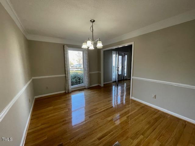 107 Glen Alpine Circle Cary, NC 27513 - Photo 6 of 17 wooden floor in an empty room with a window