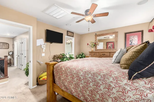 a bed room with a bed and a window