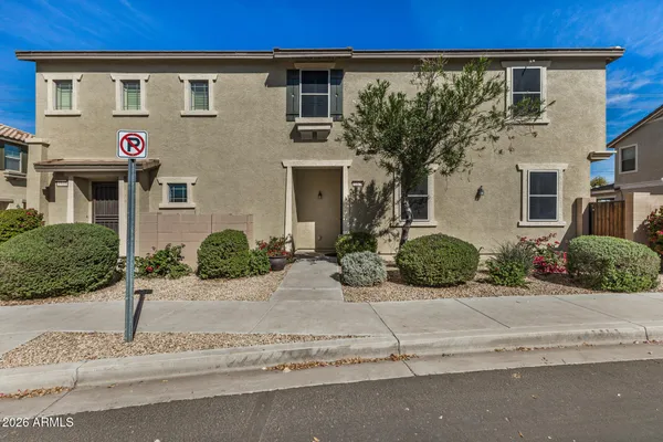 front view of a house with a street