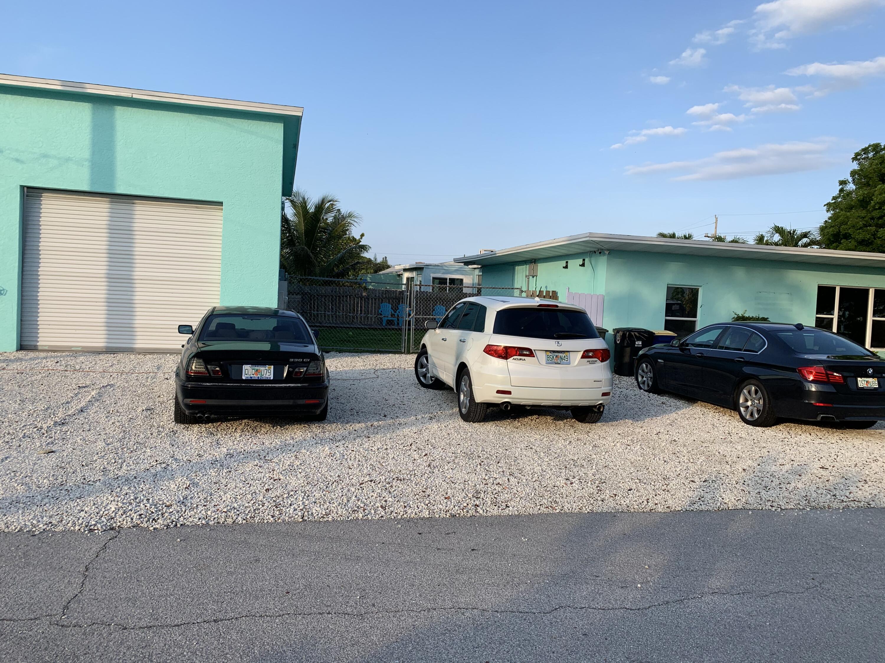 142 Eldorado Street Fort Pierce, FL 34949 - Photo 2 of 5 a car parked in front of a house
