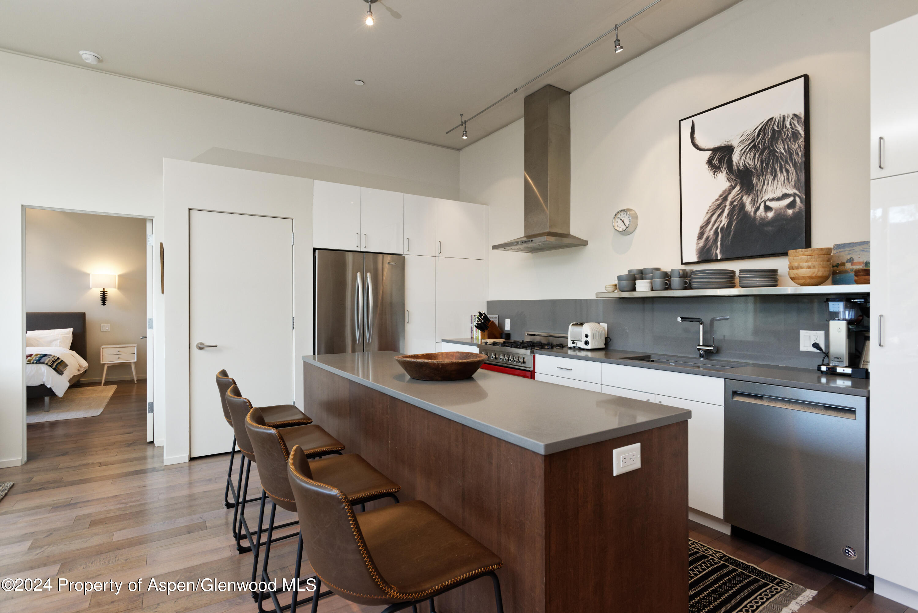 202 Evans Road, Unit 204 Basalt, CO 81621 - Photo 4 of 11 a kitchen with a sink cabinets and refrigerator
