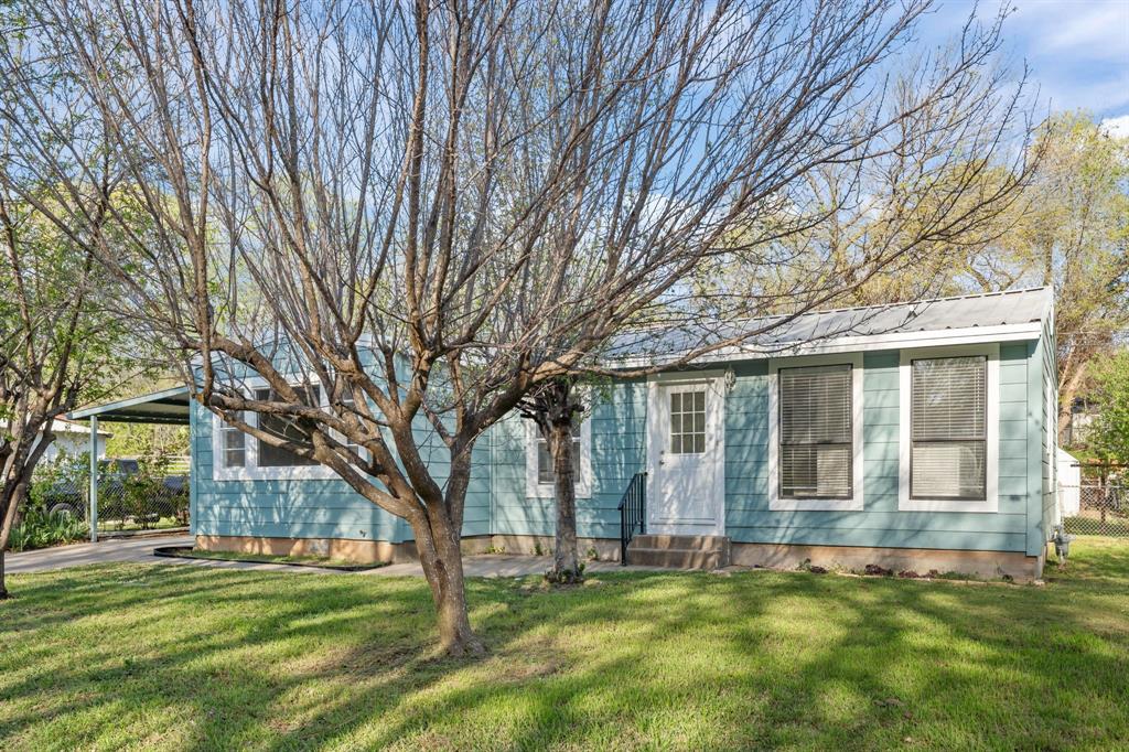 217 Clinton Drive Weatherford, TX 76086 - Photo 1 of 19 a view of a house with a yard