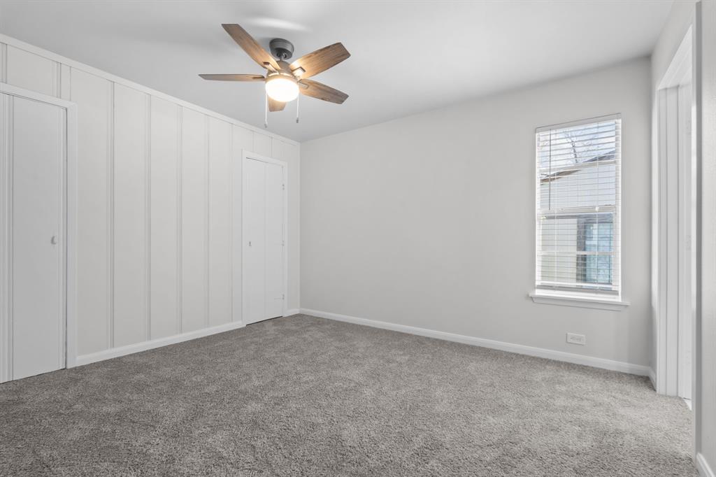 217 Clinton Drive Weatherford, TX 76086 - Photo 12 of 19 an empty room with windows and fan
