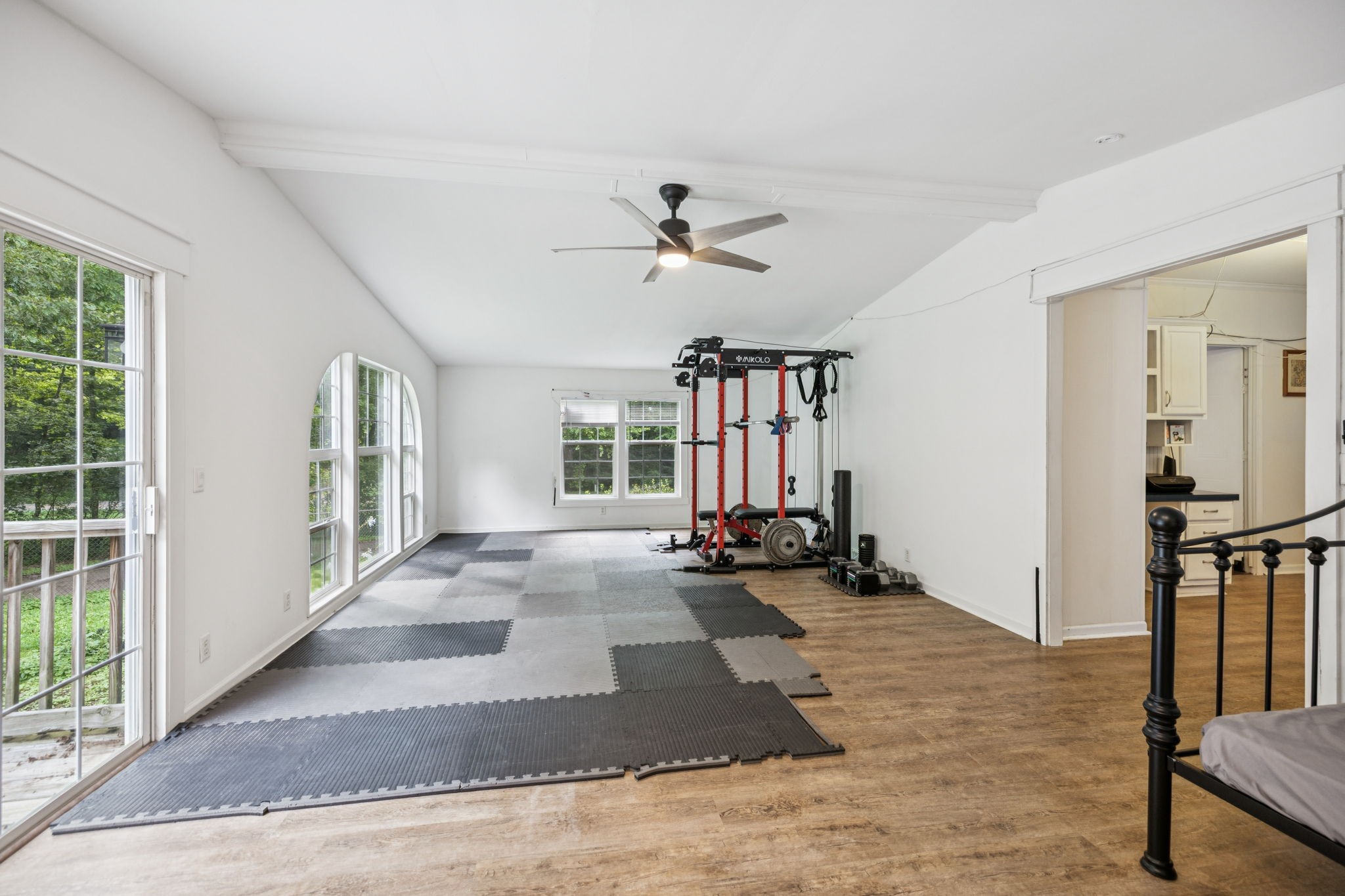 3063 Sweethome Road Chapmansboro, TN 37035 - Photo 26 of 46 a view of a livingroom with hardwood floor and a ceiling fan