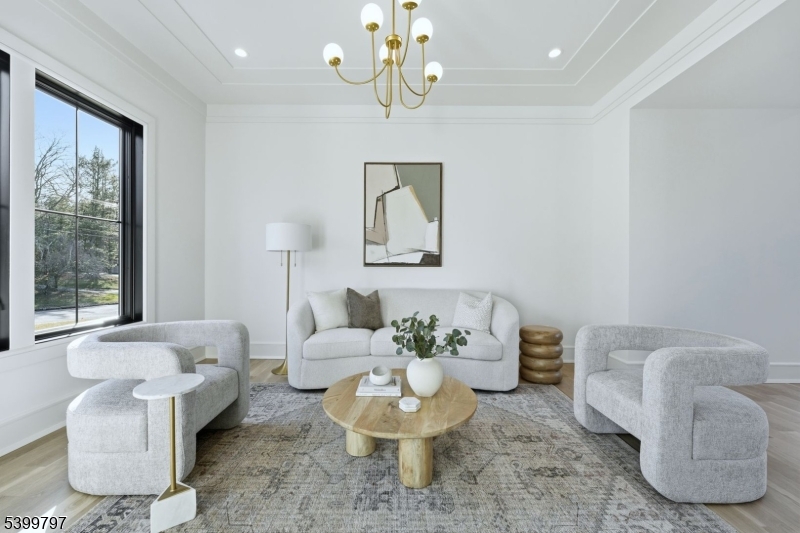 15 Sparta Road Short Hills, NJ 07078 - Photo 3 of 16 a living room with furniture and a large window