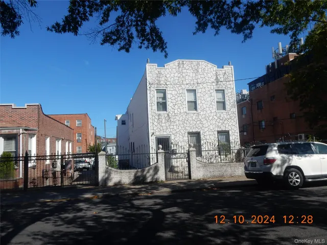 a front view of a house with a balcony