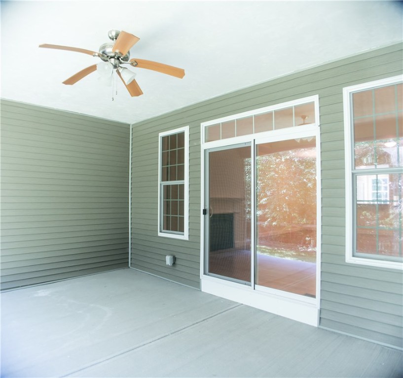 315 Old River Road, Unit 25 Lincoln, RI 02838 - Photo 27 of 28 Covered rear patio. Can be screened or enclosed for additional fee.