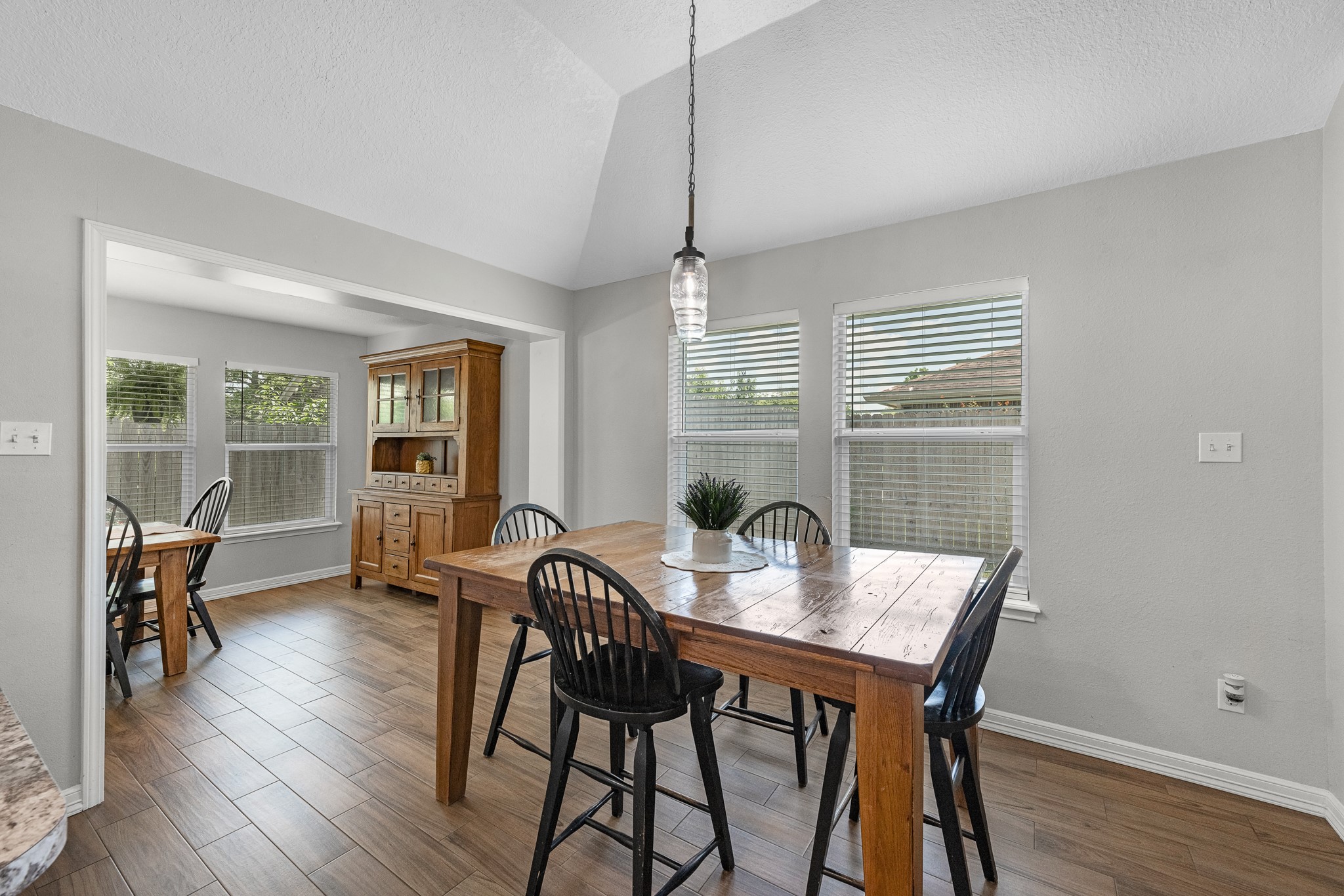 606 Walnut Street Sweeny, TX 77480 - Photo 14 of 28 a view of a dining room with furniture window and wooden floor