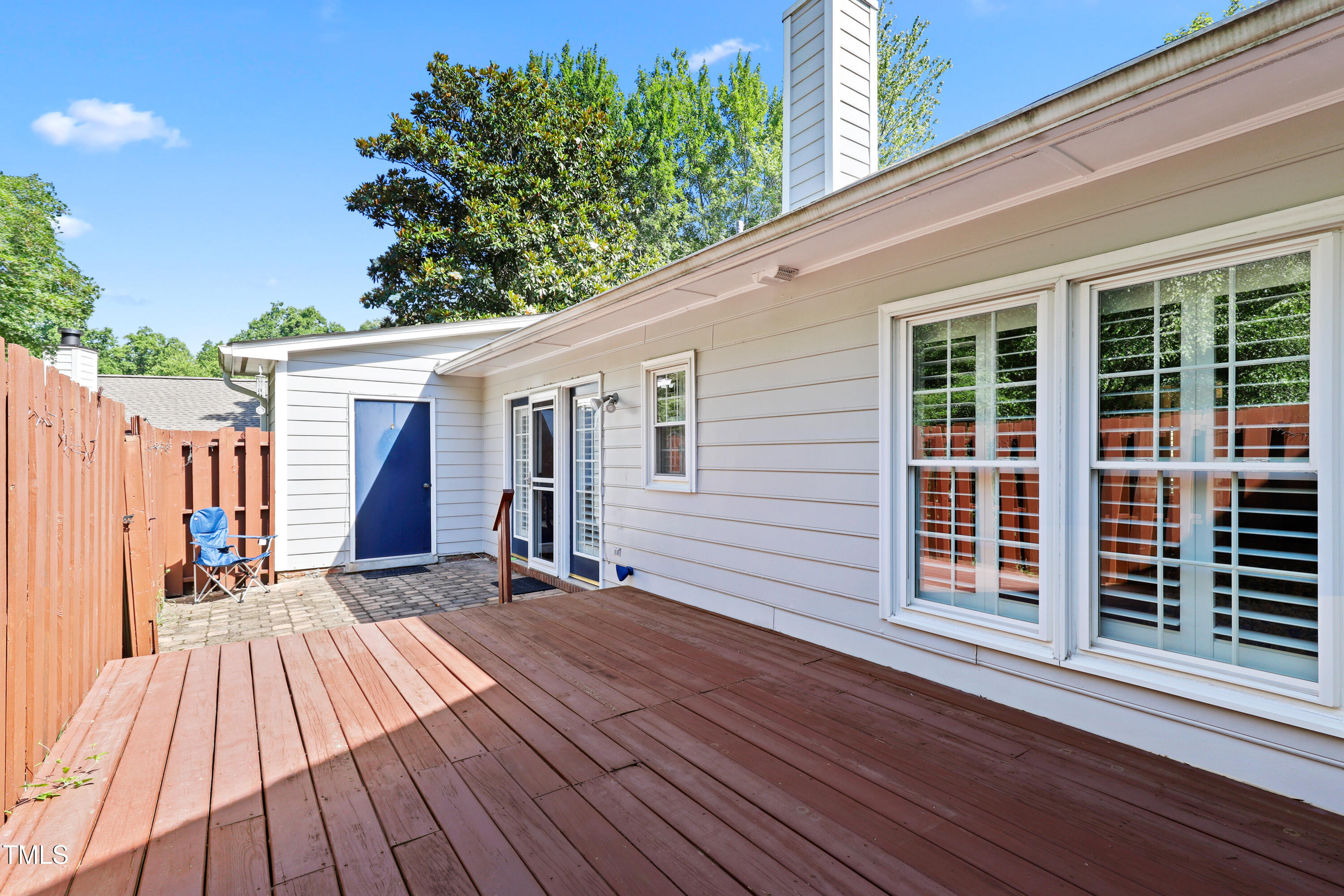 2617 Cottage Circle Raleigh, NC 27613 - Photo 24 of 27 a view of backyard with a deck and wooden floor