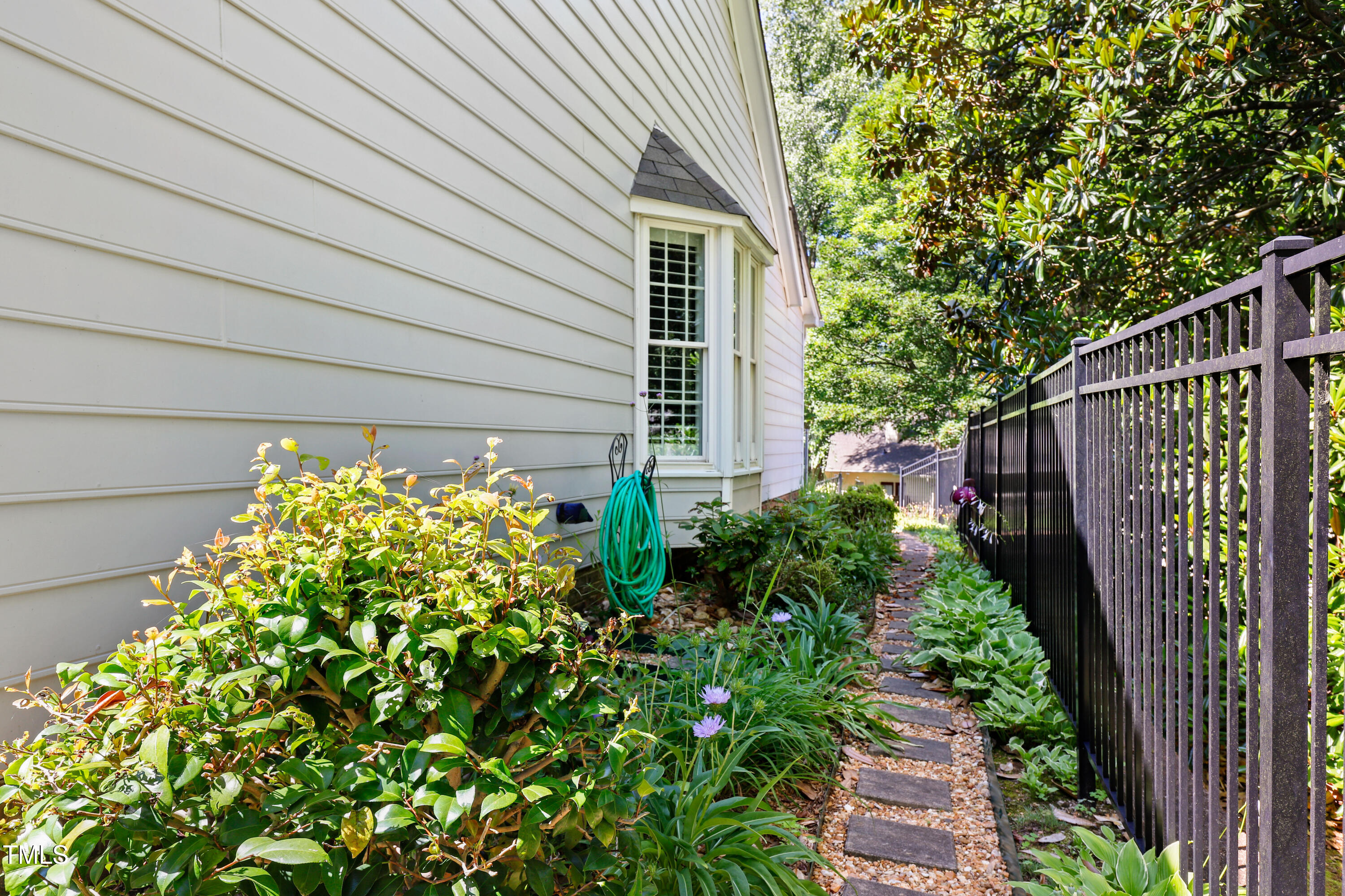 2617 Cottage Circle Raleigh, NC 27613 - Photo 25 of 27 a view of a garden with pathway