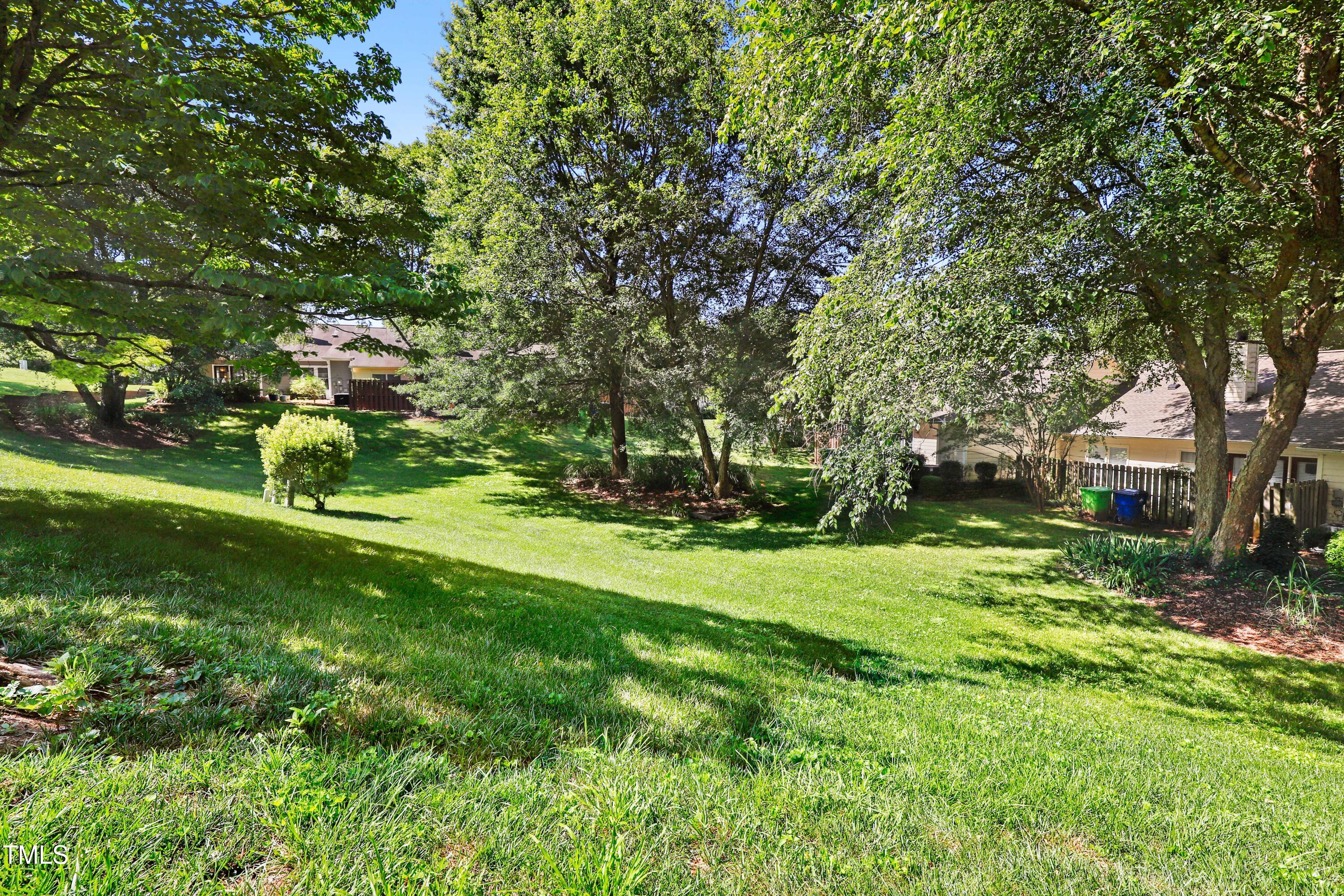 2617 Cottage Circle Raleigh, NC 27613 - Photo 27 of 27 a view of a field with a tree