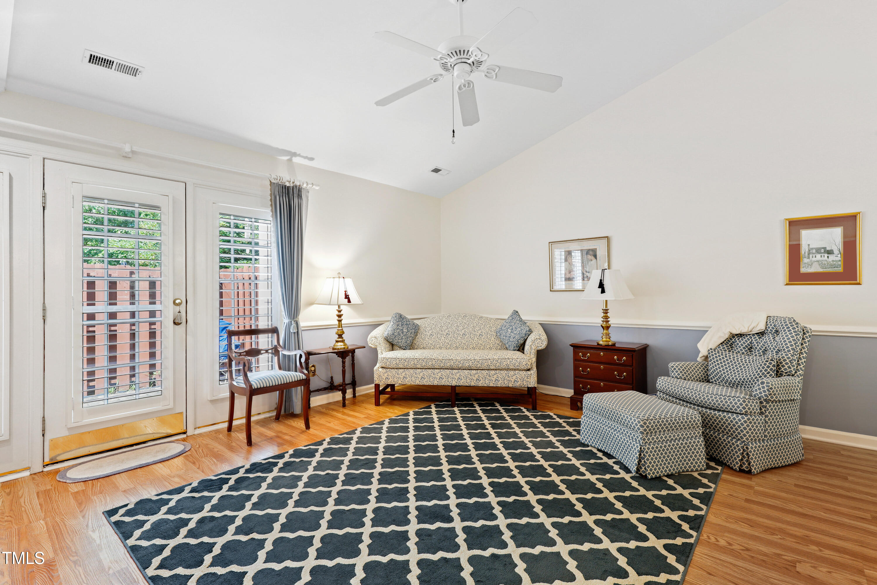 2617 Cottage Circle Raleigh, NC 27613 - Photo 6 of 27 a living room with furniture and a rug