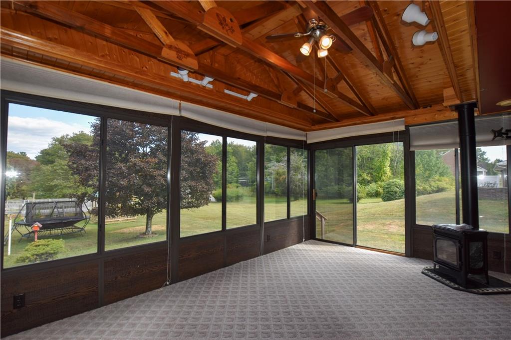 219 A Meridian Road Butler, PA 16001 - Photo 12 of 43 a view of a room with wooden floor and outdoor space