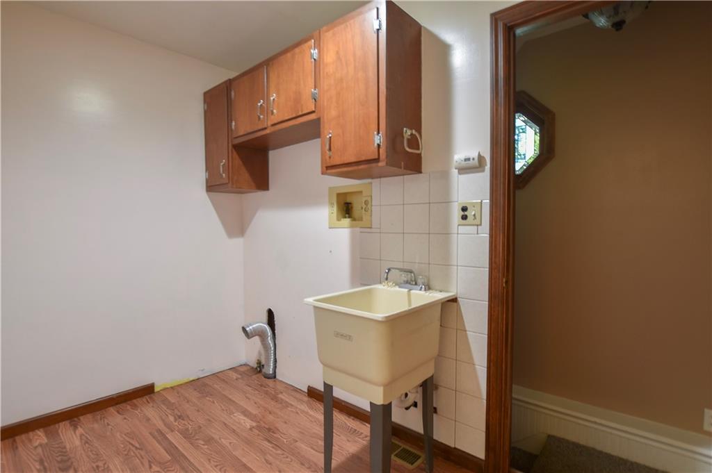 219 A Meridian Road Butler, PA 16001 - Photo 24 of 43 a bathroom with a sink and a mirror