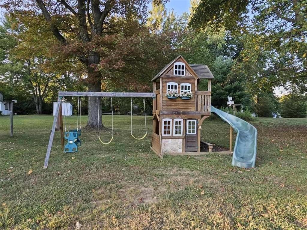 219 A Meridian Road Butler, PA 16001 - Photo 41 of 43 a view of a park with large trees and wooden fence
