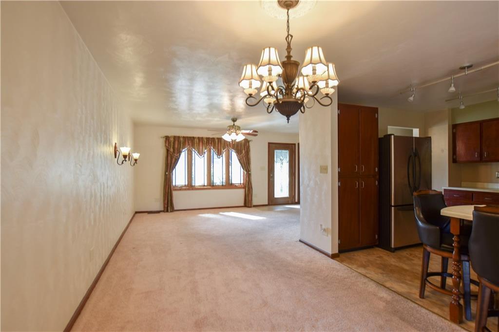 219 A Meridian Road Butler, PA 16001 - Photo 8 of 43 a view of a chandelier and a chandelier in dining room