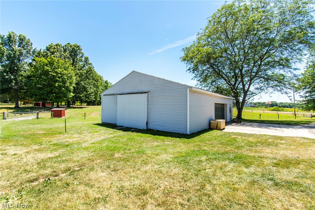 11711 Bandy Road Alliance, OH 44601 - Photo 21 of 50 View of outbuilding with a lawn