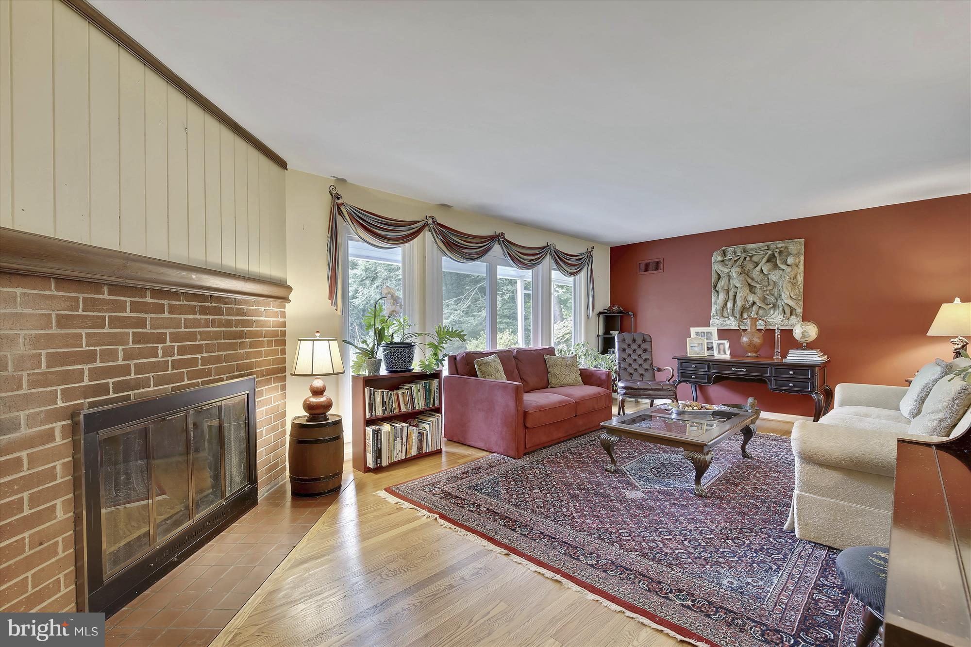 9121 Seven Locks Road Bethesda, MD 20817 - Photo 3 of 30 a living room with furniture and a fireplace