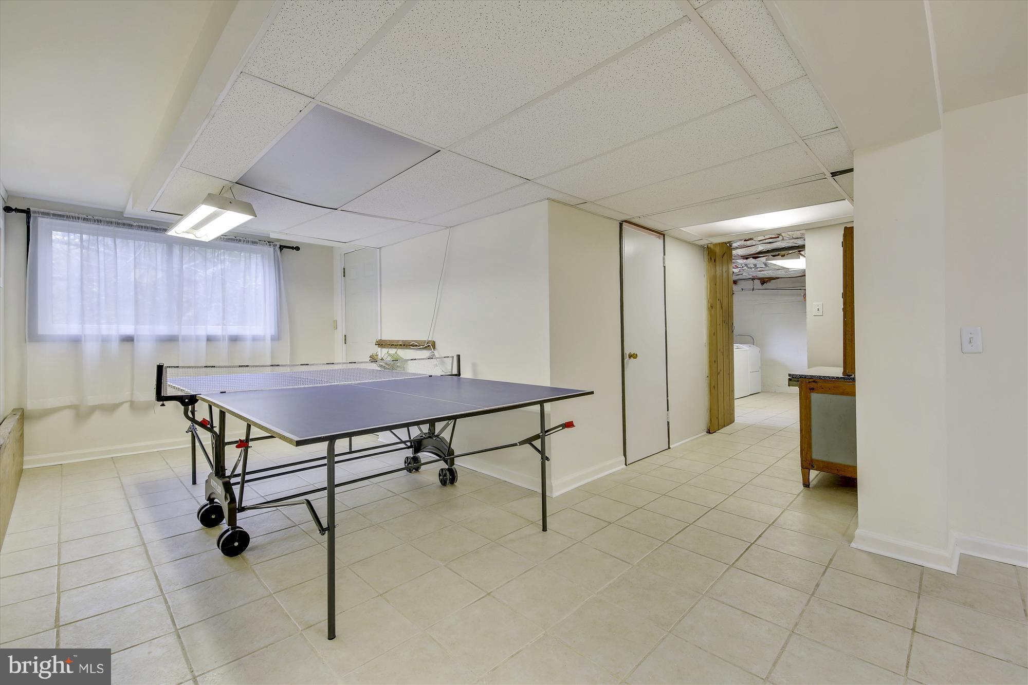 9121 Seven Locks Road Bethesda, MD 20817 - Photo 22 of 30 a view of a room with furniture and wooden floor
