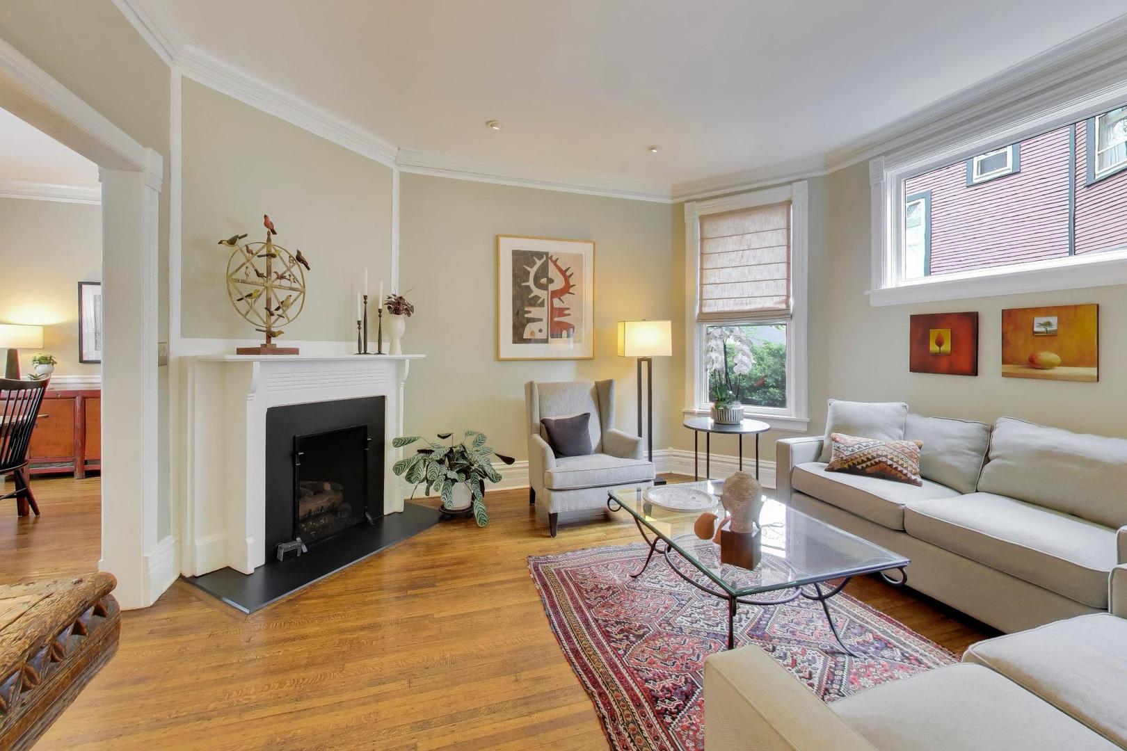 1235 Maple Avenue Evanston, IL 60202 - Photo 11 of 57 a living room with furniture a fireplace and window