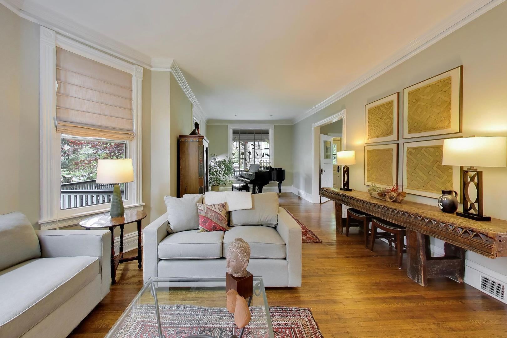 1235 Maple Avenue Evanston, IL 60202 - Photo 12 of 57 a living room with furniture and a table
