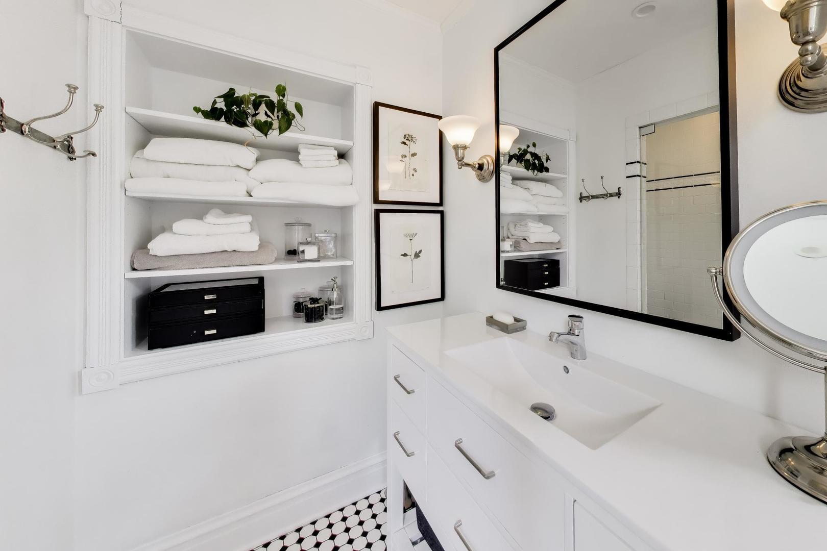 1235 Maple Avenue Evanston, IL 60202 - Photo 32 of 57 a bathroom with a sink and mirror