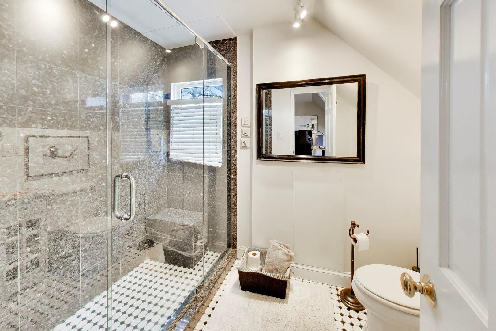 1235 Maple Avenue Evanston, IL 60202 - Photo 43 of 57 a bathroom with a toilet sink and shower