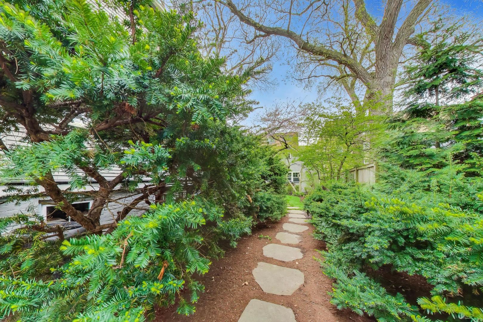 1235 Maple Avenue Evanston, IL 60202 - Photo 54 of 57 a view of a pathway both side of yard