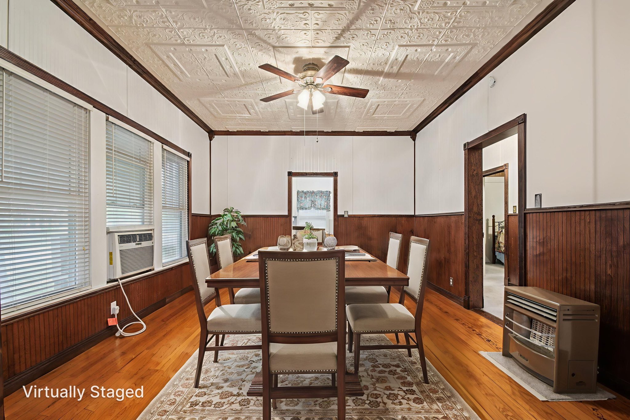 611 North Main Street Elgin, TX 78621 - Photo 10 of 26 a dining room with furniture a window and a chandelier