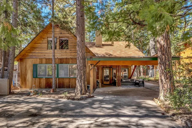 a view of a street with houses on both side