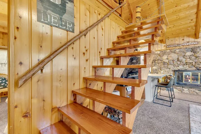 a bed room with a bed and a window