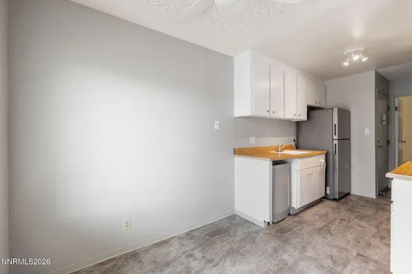 a view of a kitchen with a sink
