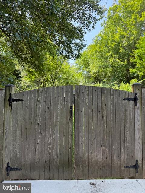 1247 Silver Run Drive Pasadena, MD 21122 - Photo 53 of 100 Gate off Concrete Pad to Back Yard