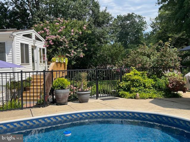 1247 Silver Run Drive Pasadena, MD 21122 - Photo 88 of 100 Sun room deck entry