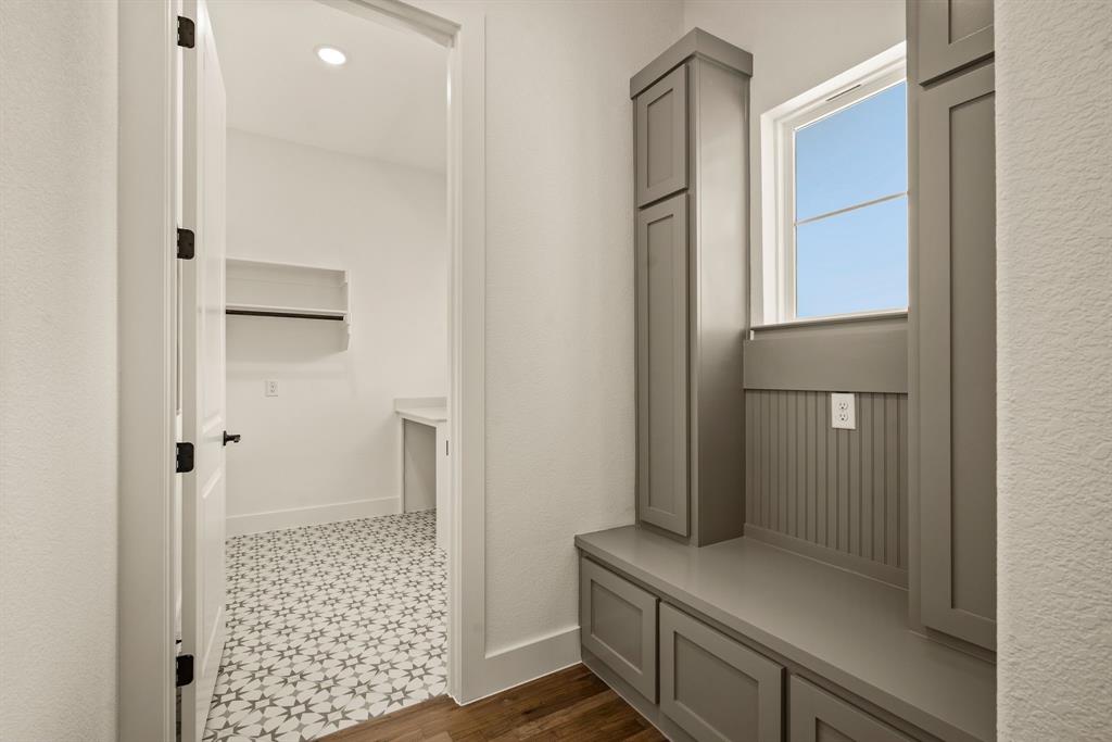 149 Highgate Court Boyd, TX 76023 - Photo 34 of 40 a bathroom with a shower and a sink