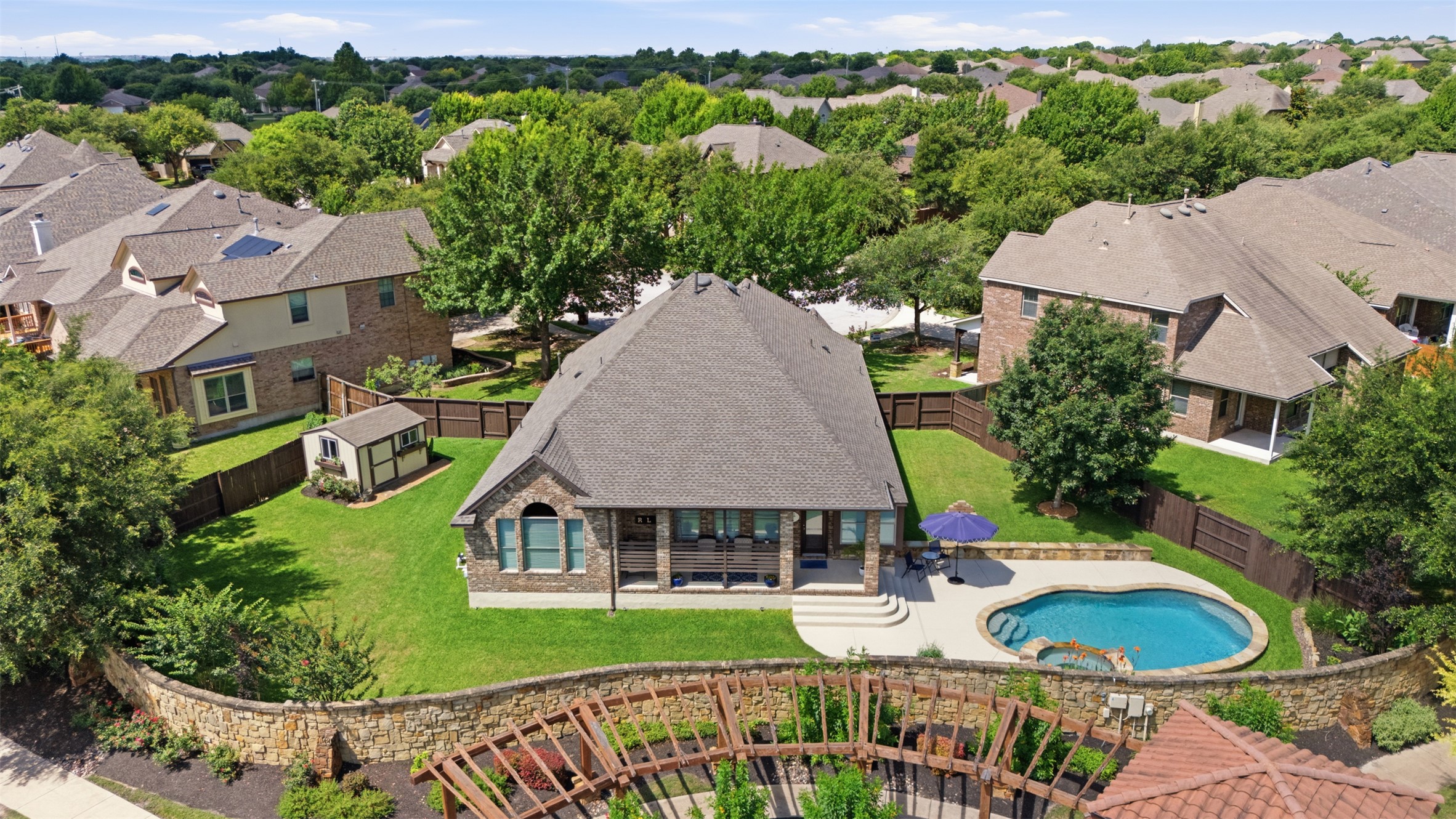 2568 Santa Barbara Loop Round Rock, TX 78665 - Photo 27 of 34 an aerial view of a house with garden space and street view