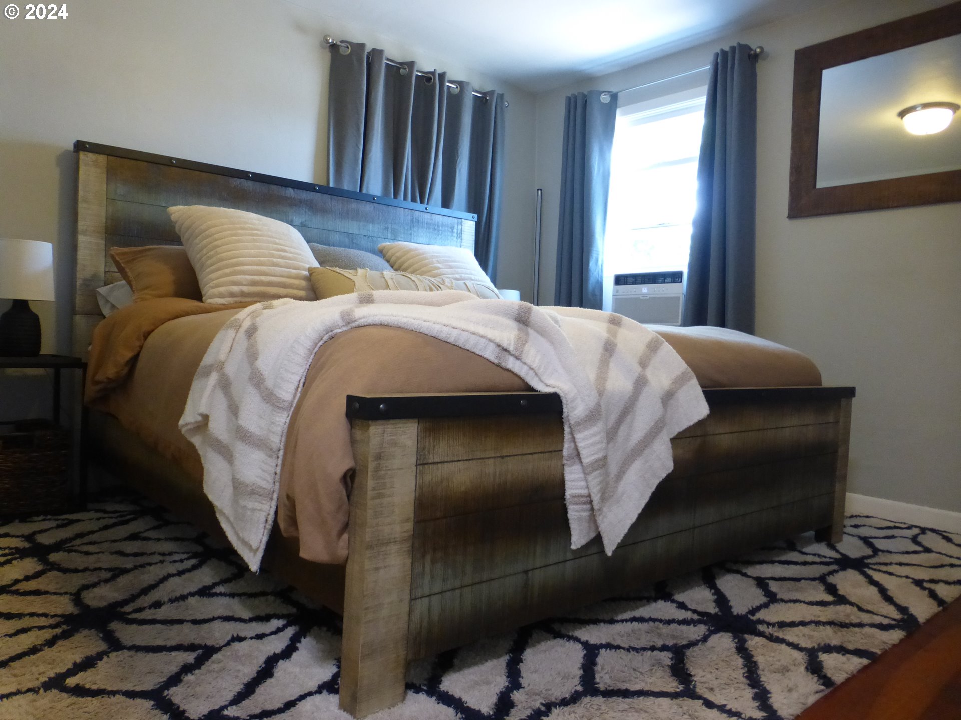 1026 M Street Springfield, OR 97477 - Photo 14 of 20 a bedroom with a bed and a window